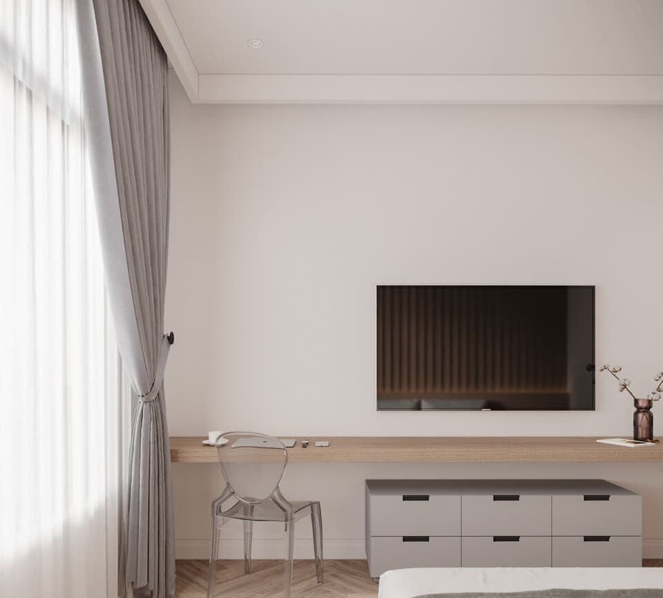 Dormitorio moderno con molduras decorativas, pared blanca, mueble minimalista y TV de pantalla plana.