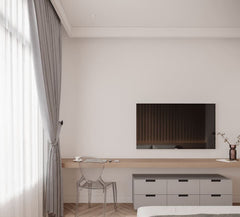 Dormitorio moderno con pared blanca, moldura decorativa, escritorio de madera y televisor.