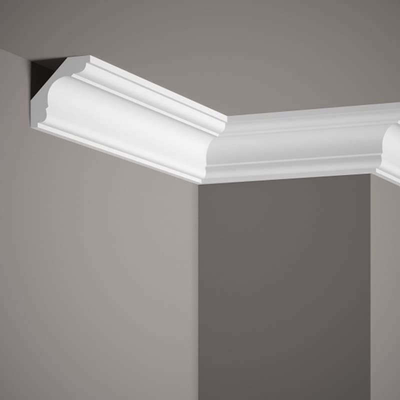 Moldura decorativa blanca en esquina de techo y pared, diseño clásico, paredes grises