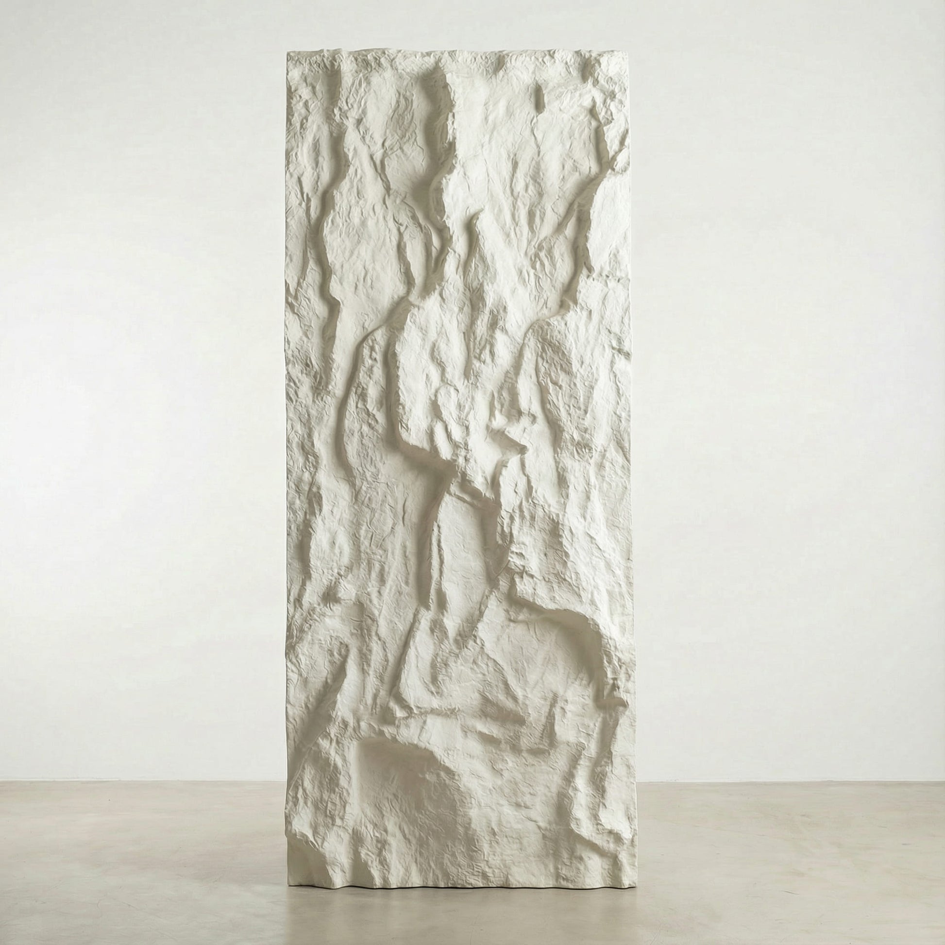 Textured decorative wall panel with a white, irregular stone-like finish for modern interiors.