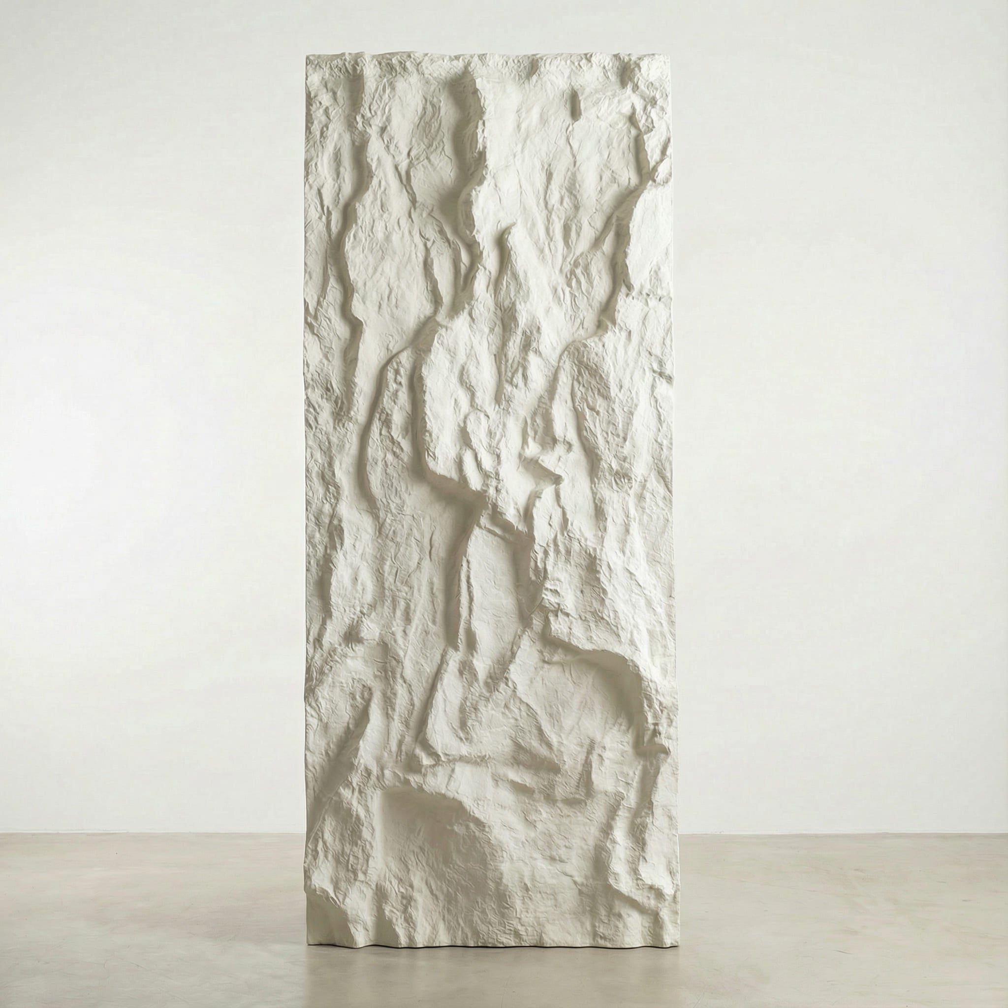 Textured decorative wall panel with a white, irregular stone-like finish for modern interiors.