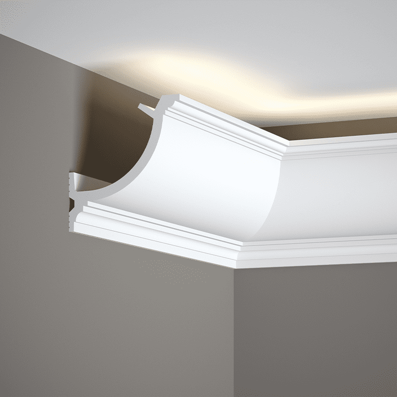 Moldura decorativa para techo en esquina, acabado blanco con iluminación indirecta.